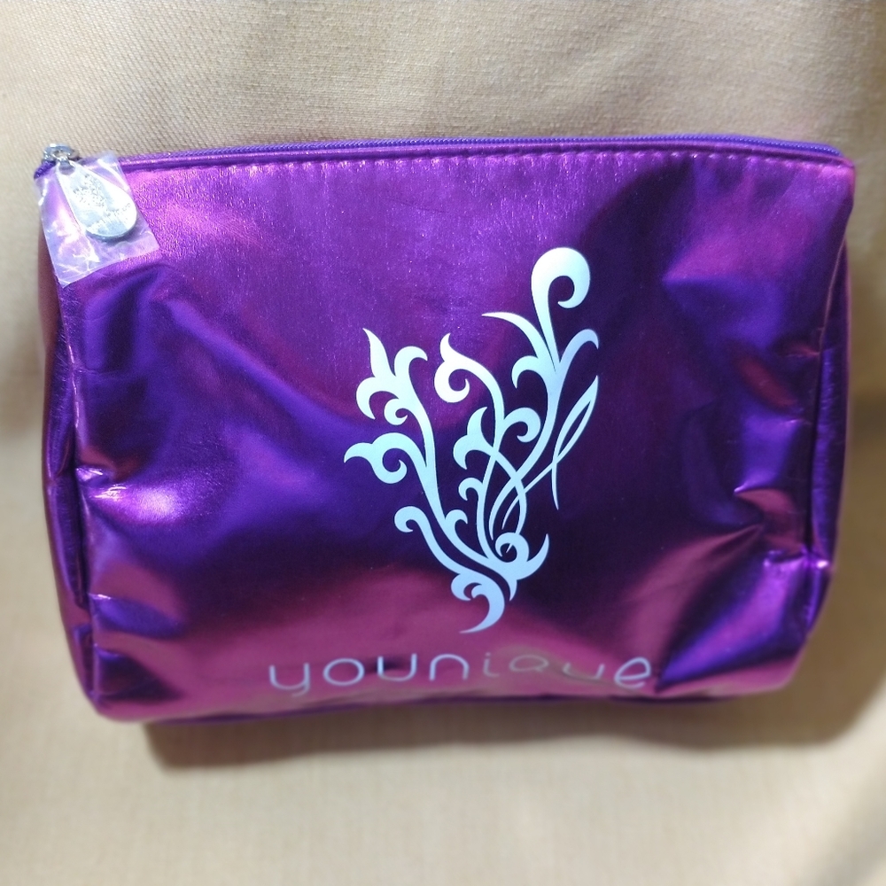 Purple Clutch With Zipper And Younique Emblem
